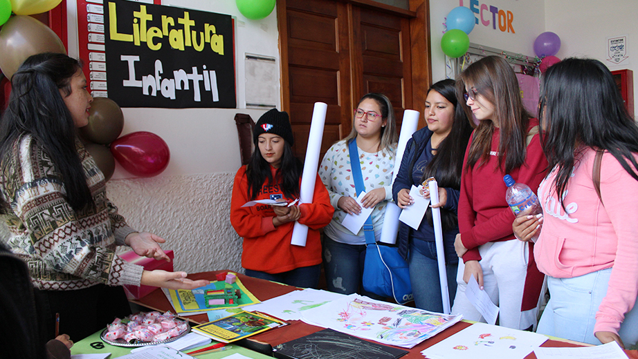 A student presenting her project