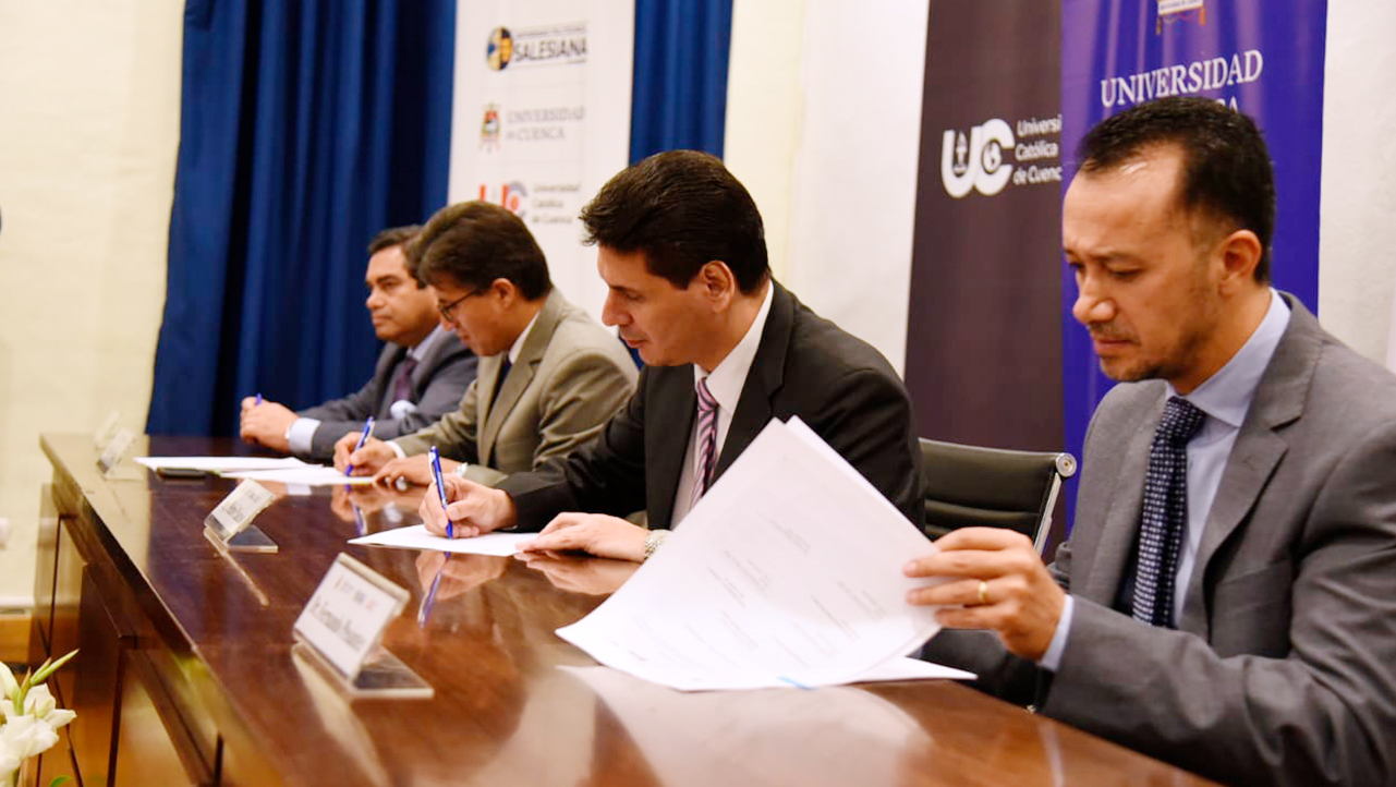 University representatives and the mayor signing the agreement (courtesy photo)
