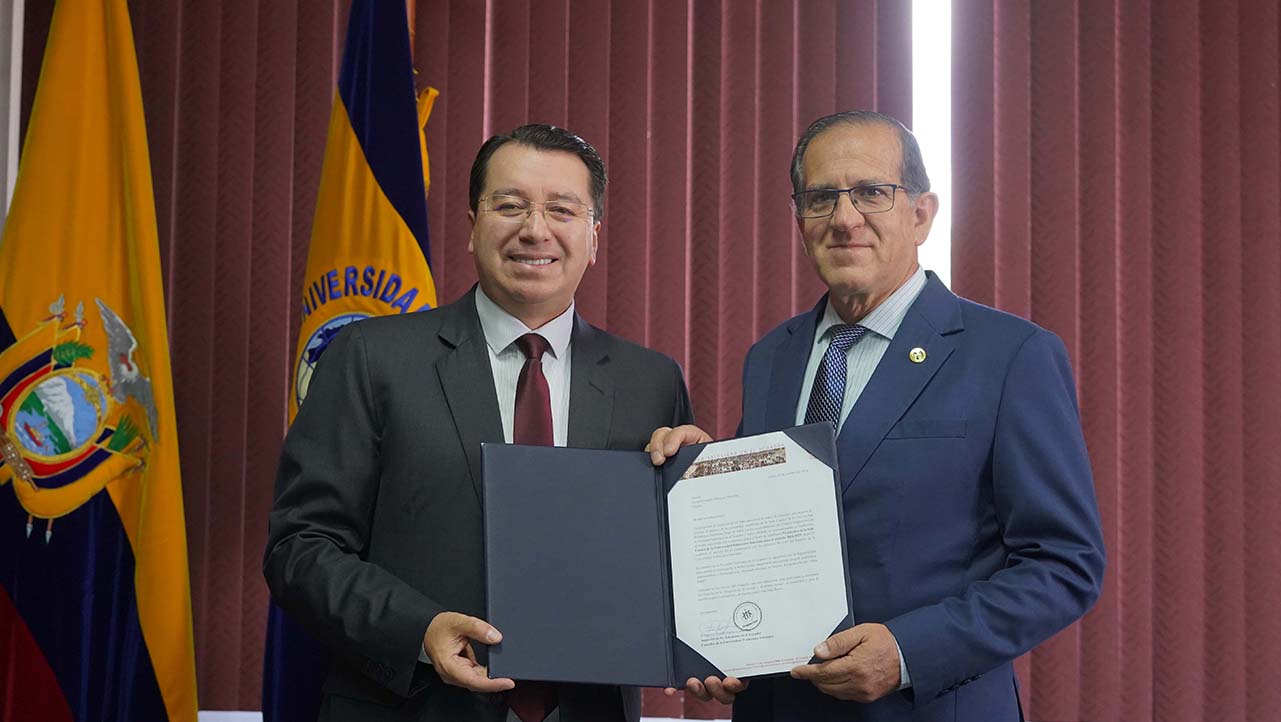 (De izq.) P. Juan Cárdenas y Fernando Moscoso, Vicerrector reelecto