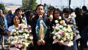 UPS students and workers during the procession